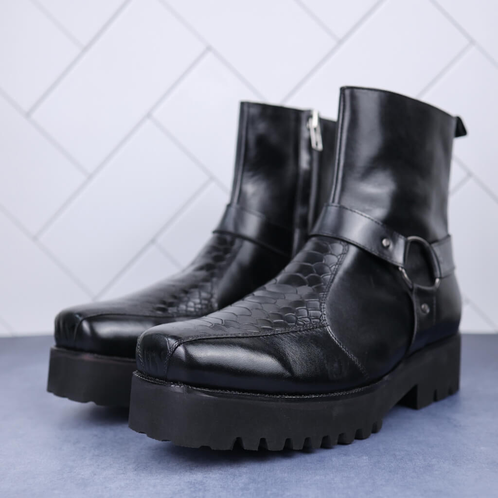 Premium handcrafted boots made from 100% Argentina leather, featuring a robust anti-skid EVA sole for superior grip and a 2.5-inch height increase. The sleek design with buckle detailing and textured leather finish offers versatile style for both casual and formal wear.