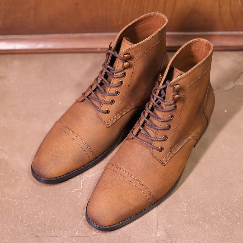A pair of Velvet Noir Nubuck Boots featuring a luxurious Nubuck upper and a durable Dianite sole for exceptional anti-skid performance and comfort. Designed with a leather insole for superior cushioning, these boots combine rugged durability with timeless elegance, perfect for bikers, hikers, and fashion enthusiasts.