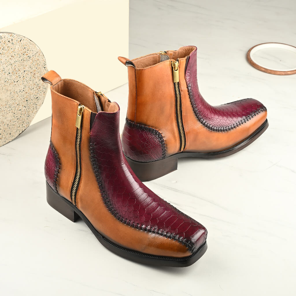 "Mille Dollari Monarch Dual-Tone Broad Toe Boots—handcrafted tan and maroon exotic leather with a textured finish, broad toe design, and sleek side zippers for a perfect blend of style and comfort."