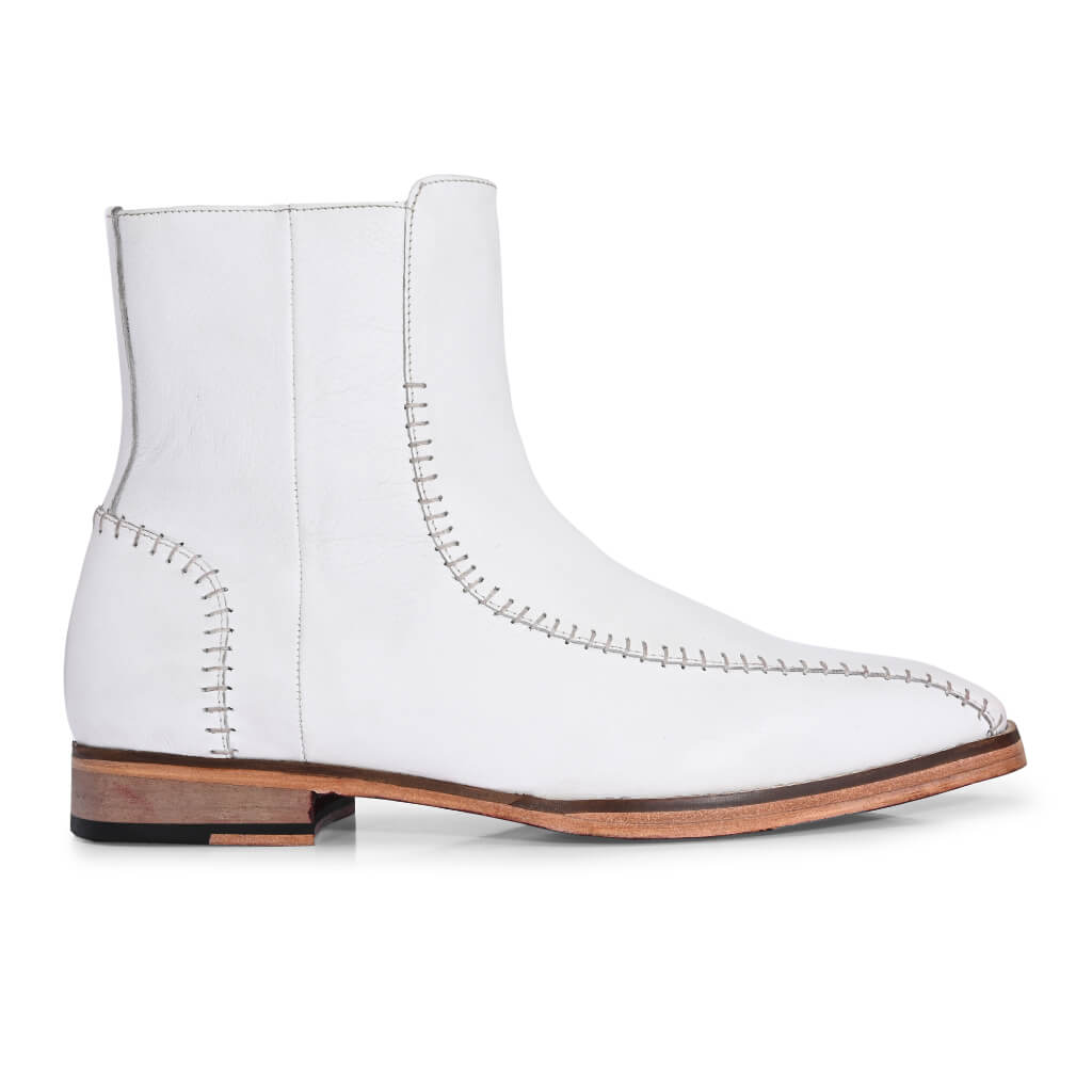 Exquisite Handcrafted White Leather Boots with Intricate Stitching