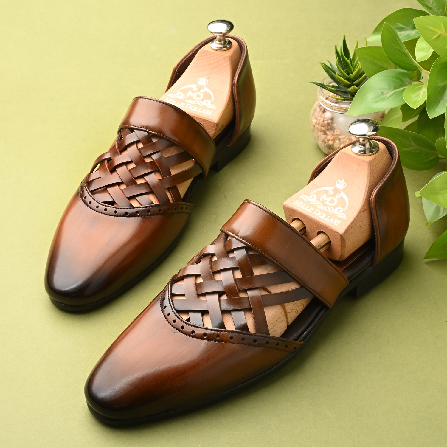 Men’s handcrafted brown woven leather cross-strap slip-on sandals with premium patina finish