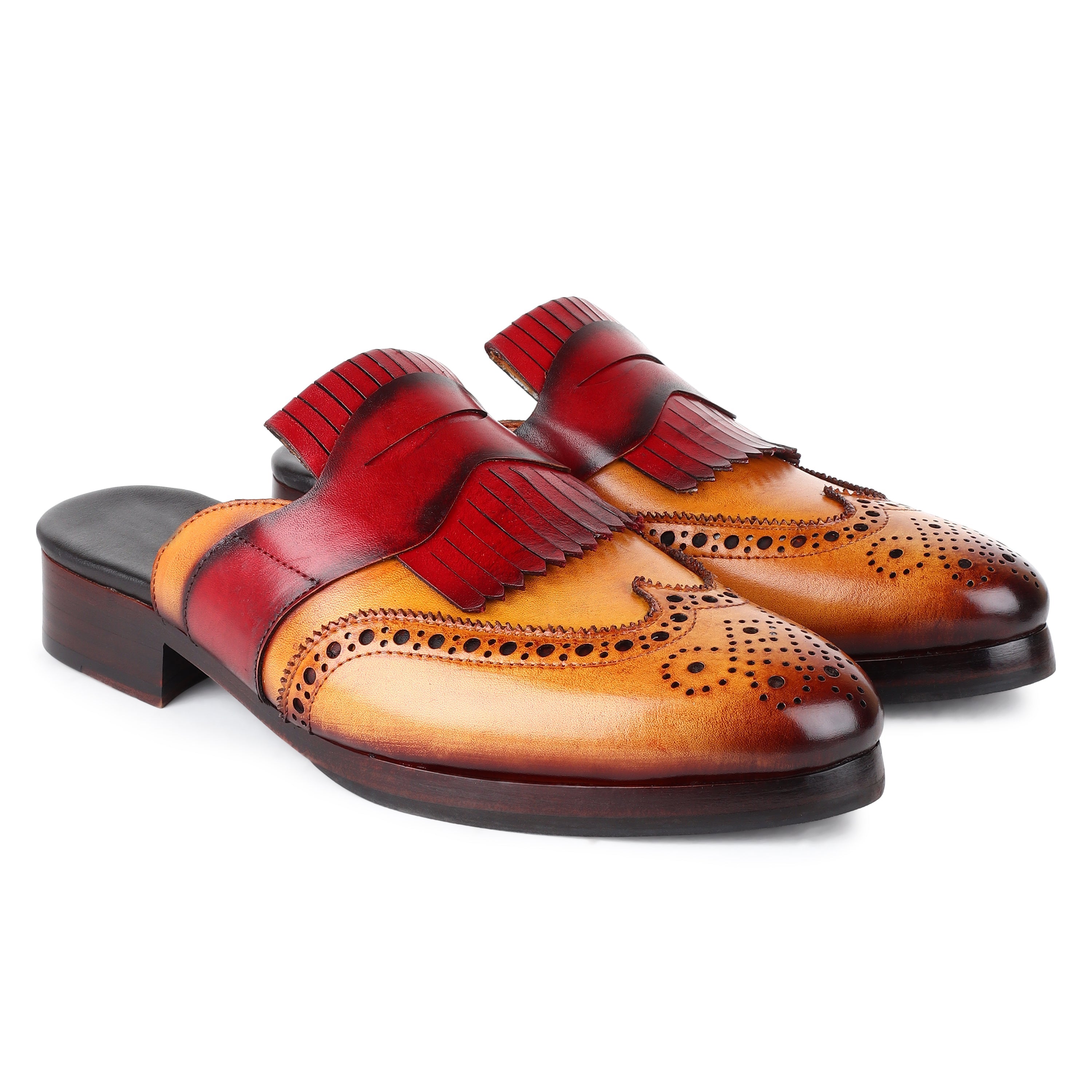 Men’s tan and burgundy two-tone leather kiltie tassel brogue loafers with wingtip perforation and slip-on design