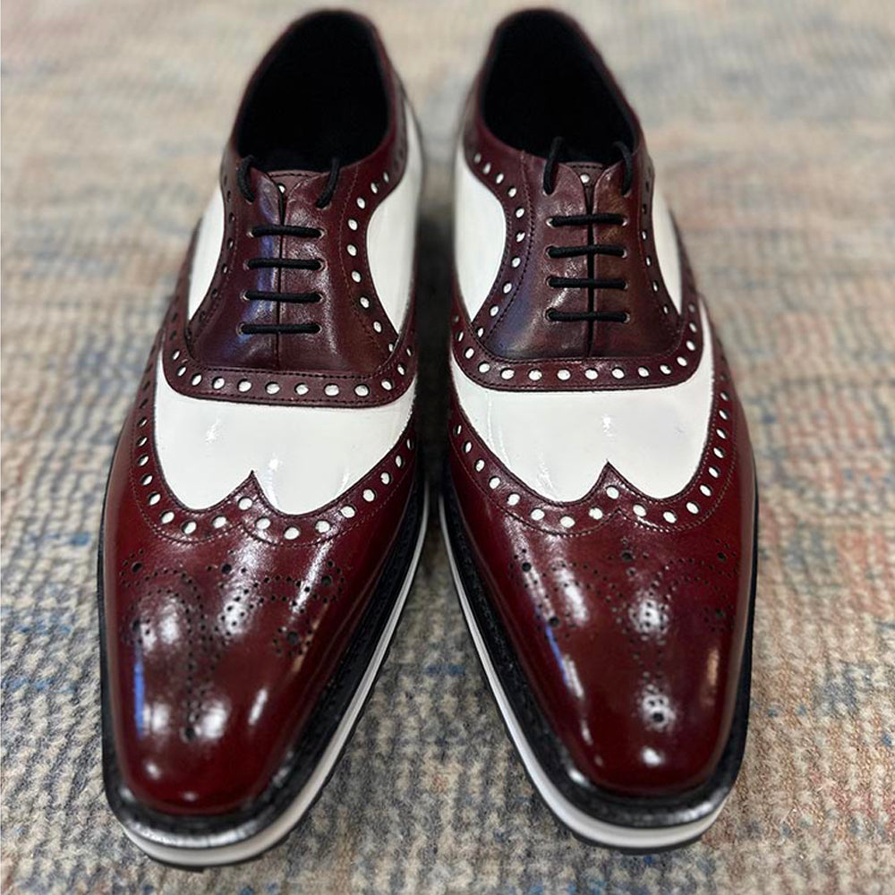 Men’s burgundy and white two-tone leather brogue oxford shoes with wingtip perforation and lace-up closure
