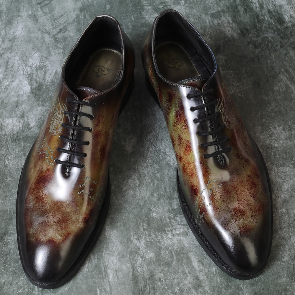 "Marble Patina Mirror Glossed shoes with a high-gloss finish, unique patina design, and signature detailing for a sophisticated and exclusive look."