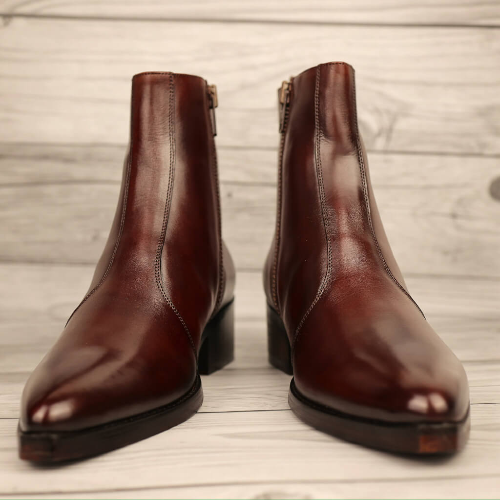 Montana Zipper Cowboy Boots in Cognac made from premium leather, featuring a durable zipper closure, intricate stitching, and a rugged design. These boots offer timeless Western style with a comfortable leather sole, perfect for casual or ranch wear.