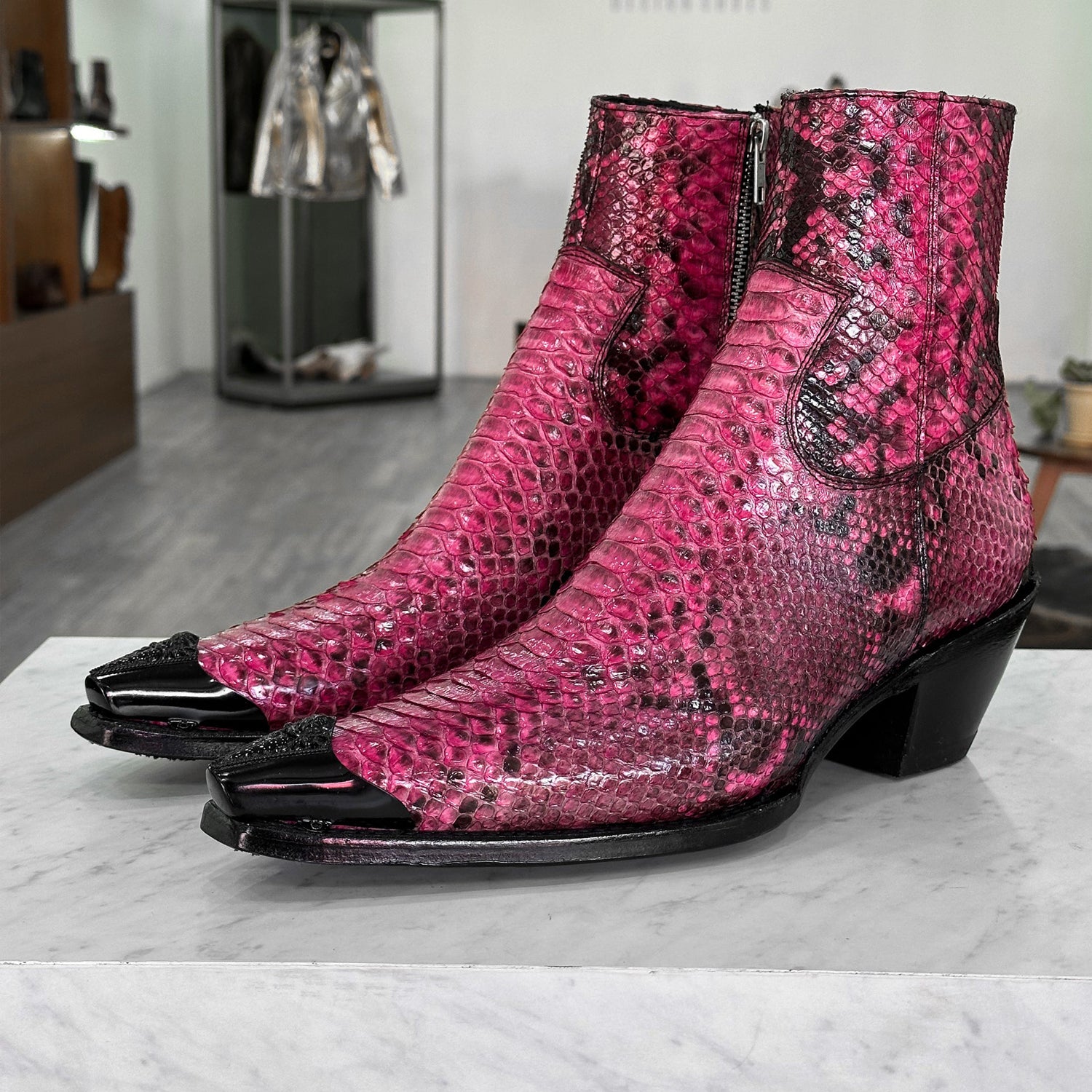 Men’s pink python textured leather ankle boots with side zipper and pointed toe design