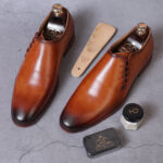 Side Lace-Up Wholecut Oxfords In Cognac