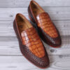 Stylish Mille Dollari tan croco loafers, crafted with high-quality crocodile leather for a refined look.