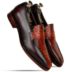 Cognac crocodile-patterned leather loafers by Mille Dollari