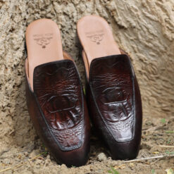 Royal Python slip-on shoes with a croco-embossed design and polished finish, featuring detailed textures resembling python scales and leather insoles for a luxurious and sophisticated look