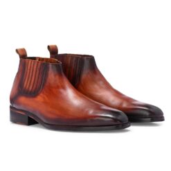 The SovereignImperium Chelsea Boots in luxurious cognac leather offer a sleek, timeless design with superior craftsmanship. Perfect for adding a touch of sophistication and versatility to any wardrobe.